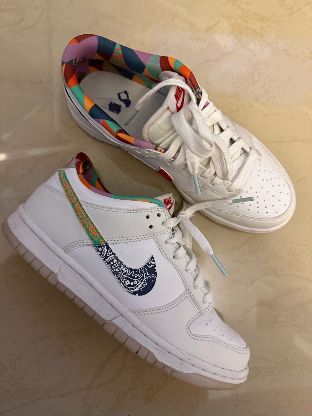 Nike Kids White Low-Top Sneakers with Multicolor Paisley Swoosh